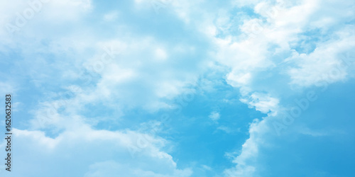 Cloudy blue summer storm  in the sky, watercolor background, horizontal view, beautiful cloudscape, fresh air, nature shining light, sunrise sky, panoramic view, daylight, vast fluffy tiny white sunsh