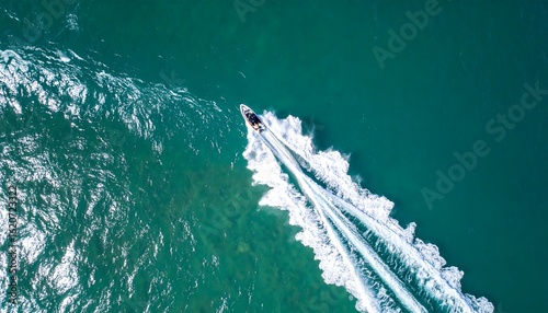 Aerial view of a jet ski on turquoise water