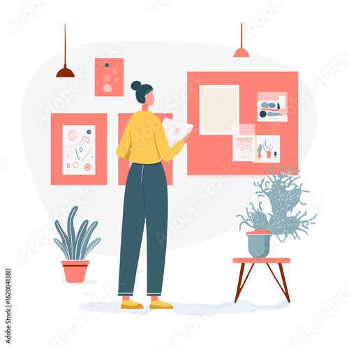 Woman analyzing art in a gallery setting.