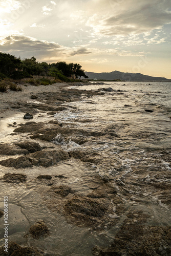 Fototapeta Naklejka Na Ścianę i Meble -  View of a beautiful beach in Sardinia, Italy, at sunset
Travel, Europe, island, vacation
