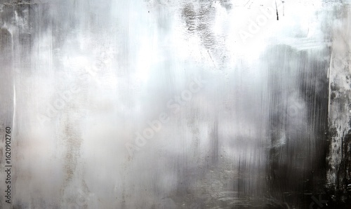 Weathered brushed metal surface bearing scratches and discoloration, presenting industrial texture and grungy metallic appearance