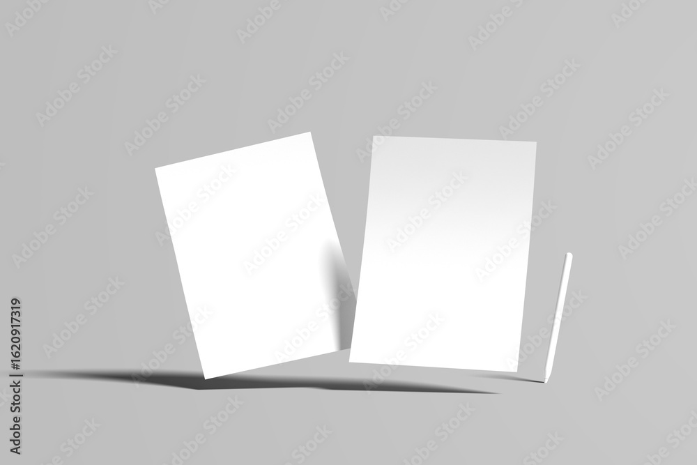 Naklejka premium Two paper invitation cards on trendy grey background with copy space for pen design presentation 