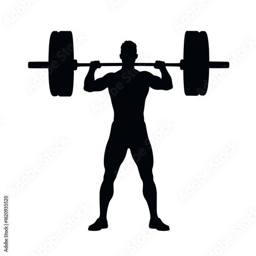 Silhouette of man lifting heavy barbell while exercising in gym  