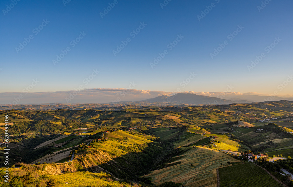 Obraz premium Marche, spectacular view and sunset on the Marche hills from the Ripatransone viewpoint.