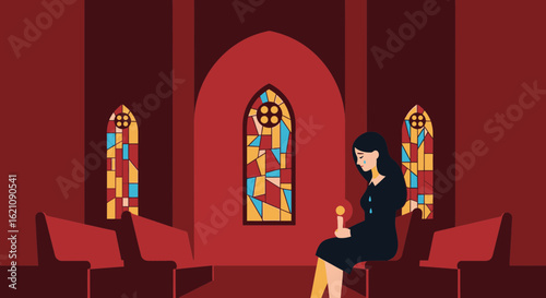 Lonely woman sits with a candle in a church surrounded by stained glass windows