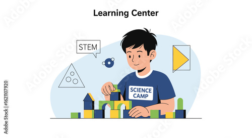 Happy Little Boy Building With Colorful Blocks At The Learning Center