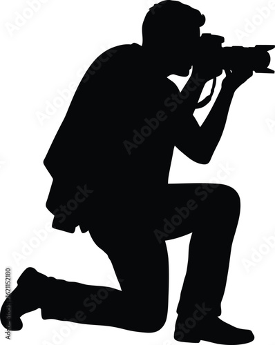 Silhouette of a photographer kneeling and taking a photo isolated on white background, ideal for photographyrelated content and creative projects