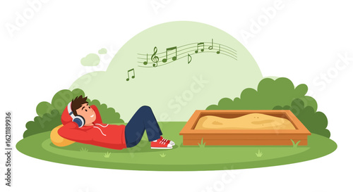 Boy listening music relaxing in park with headphones enjoying nature sounds