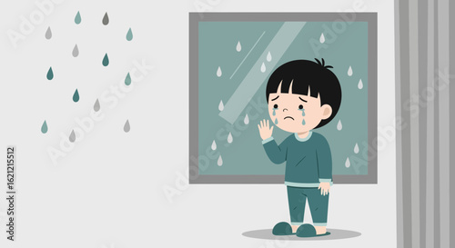 A sad little boy looking out the window at the rain with teardrops falling illustrating childhood emotions and sadness on a rainy day