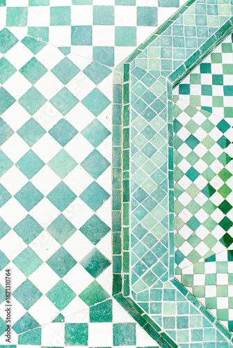 close up of white and green Moroccan tiles