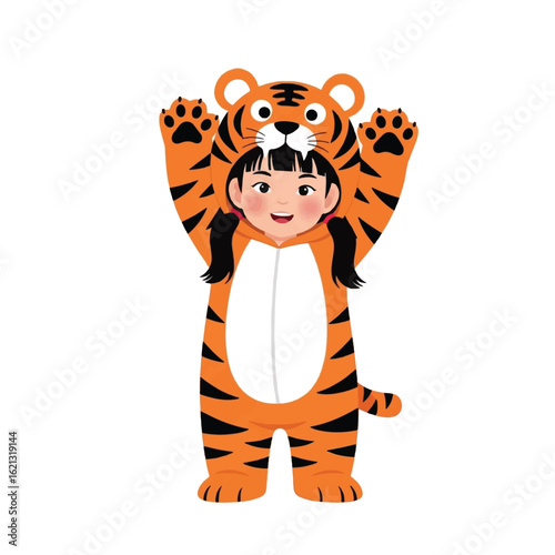 A young girl wearing a tiger costume, arms raised,  smiling happily.