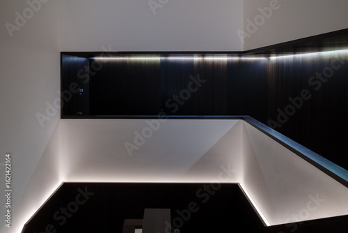 Photography Abstract view of a minimalist architectural interior with indirect LED strip lighting