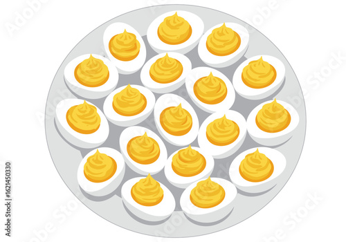A plate of deviled eggs The eggs are cut in half and filled with a yellow topping