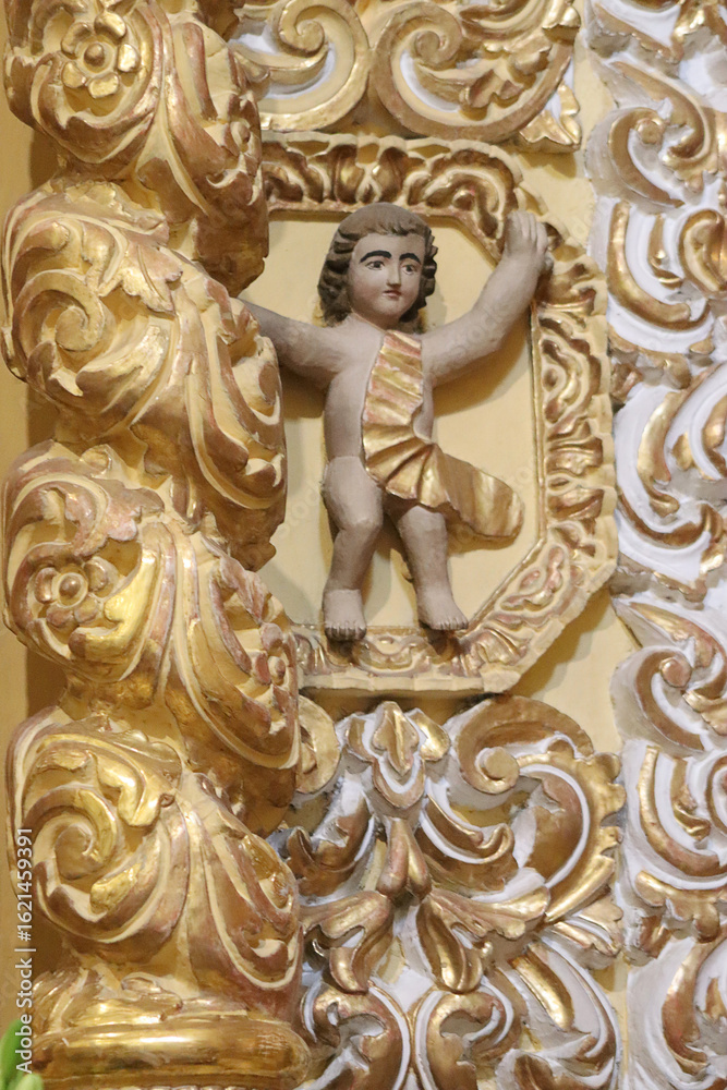 Fototapeta premium Arte sacro indígena, barroco (detalle) en el Templo de San Francisco Acatepec, Puebla, México.