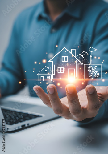 Man holding digital houses and mortgage interest rates with glowing light