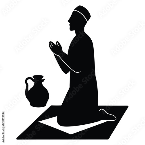 Muslim man praying on rug with pitcher traditional