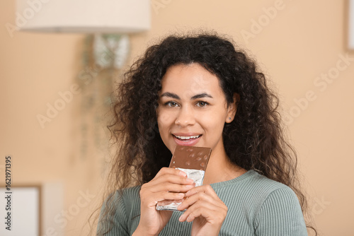 Smiling young woman enjoyin...