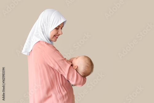 Happy Muslim mother in hija...