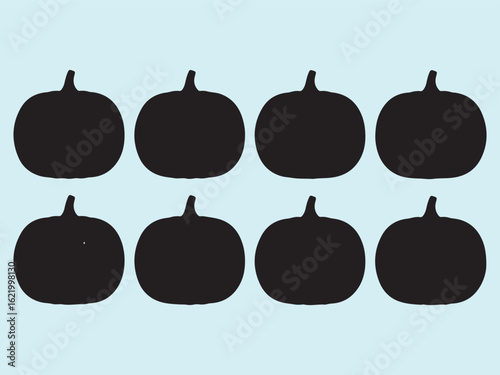 Black pumpkin silhouettes on light blue background