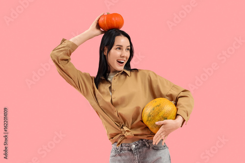 Happy young woman balancing...