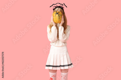 Beautiful young woman in he...