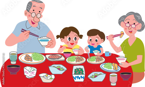食事をする老夫婦と子供たち
