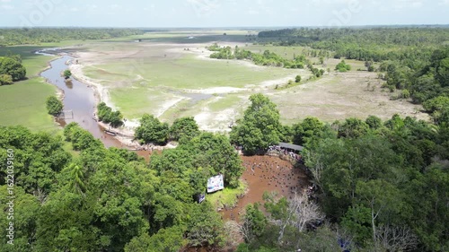 Traditional fishing by the Dayak tribe in East Barito, Central Kalimantan using a long spear called Tariuk