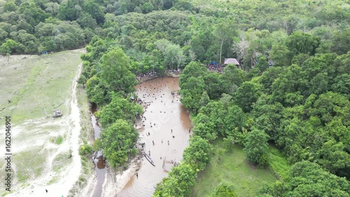 Traditional fishing by the Dayak tribe in East Barito, Central Kalimantan using a long spear called Tariuk