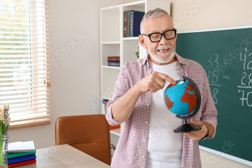 Male Geography teacher with...