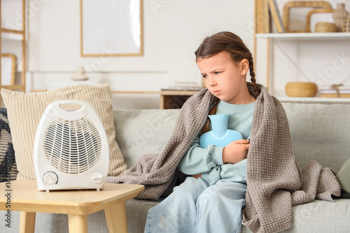Frozen little girl with hot...