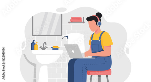 A young woman works from home in the bathroom, wearing headphones and overalls, using a laptop while sitting on a stool and surrounded by bathroom fixtures.
