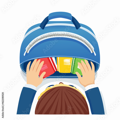 Child opening a Japanese school bag (randoseru) and taking out textbooks, viewed from above