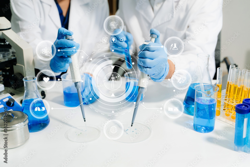 Fototapeta premium Scientists in a high tech lab conduct research with pipettes and tablets, blending medical innovation, data science, and futuristic digital healthcare technology.