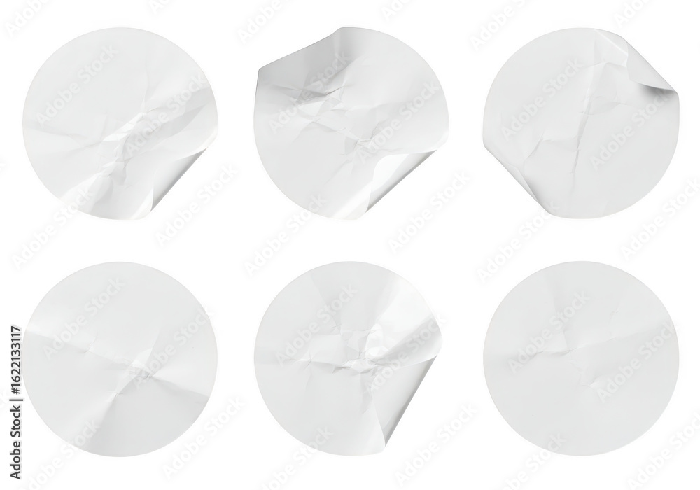 Naklejka premium A set of six round white paper stickers with various degrees of creasing and peeling are isolated on a transparent background