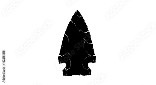 Black arrowhead isolated on white background, an ancient stone age weapon