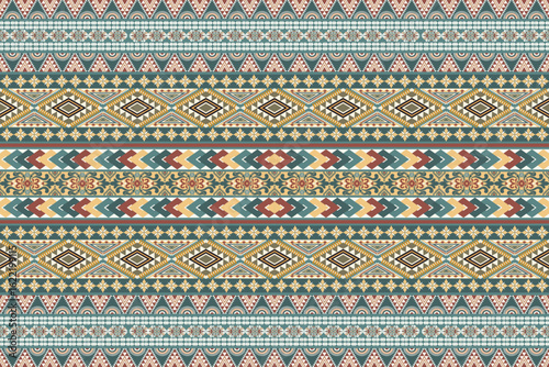 Seamless yellow and brown floral damask shape with geometric ethnic tradition boho style pattern and texture on natural pastel green background