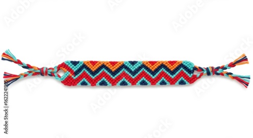 Colorful woven friendship bracelet on white background with copy space