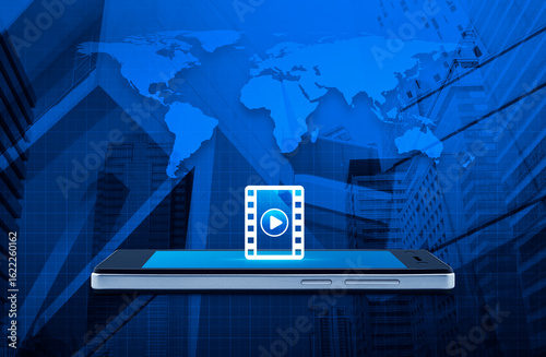 Fototapeta Naklejka Na Ścianę i Meble -  Play button with movie flat icon on modern smart mobile phone screen over world map, city tower and skyscraper, Business movie online concept, Elements of this image furnished by NASA