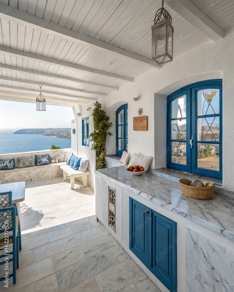 Fototapeta premium Bright veranda with blue accents overlooking the sea and coastal landscape with white furniture and decor