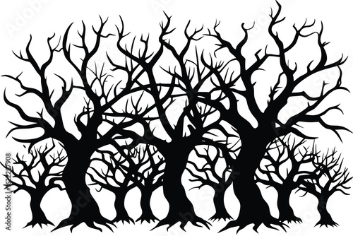 Silhouette of a spooky forest with bare gnarled trees