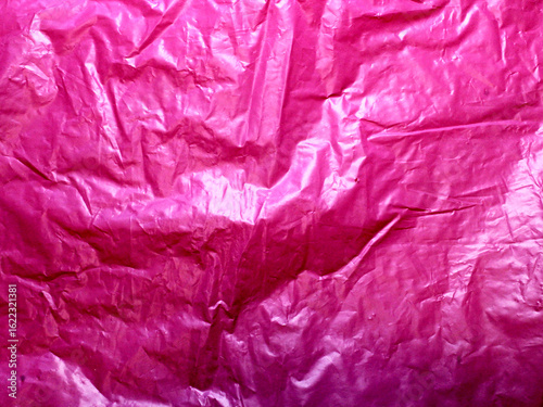 Pink plastic bags for storing groceries or other common household items, available in a variety of colors.