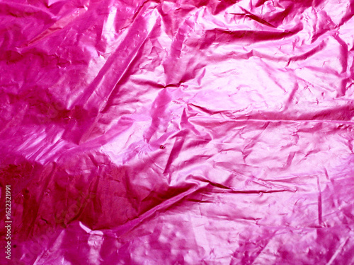Pink plastic bags for storing groceries or other common household items, available in a variety of colors.