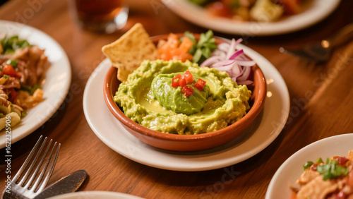 Guacamole Dip with Tortilla Chip and Garnish