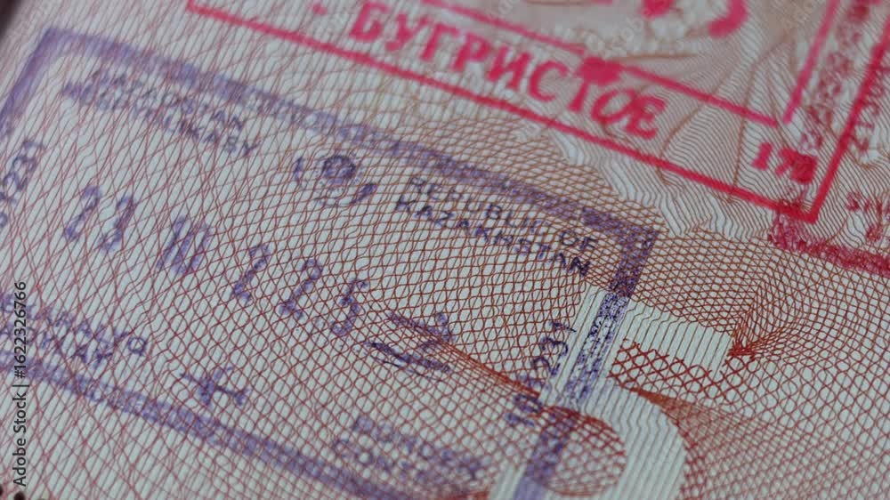 Horizontal 4K travel video. Close up part of pages of Russian foreign passport with visas, border stamps, permits to enter countries. Tourist document. Concept of tourism, visit, trip, voyage, flight