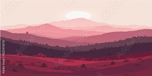 Mountain peaks touched by the golden light of a misty sunrise or a fiery sunset