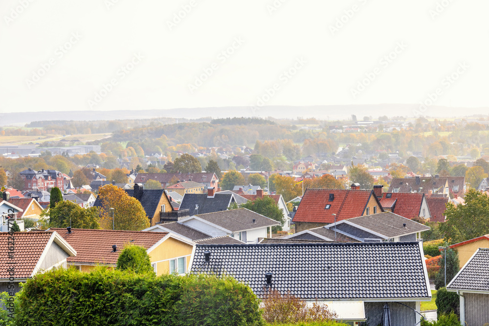 Obraz premium Residential area in a city in autumn with rain