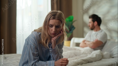 Obraz na plátně Family argument stressed Caucasian couple in bedroom divorce frustrated husband