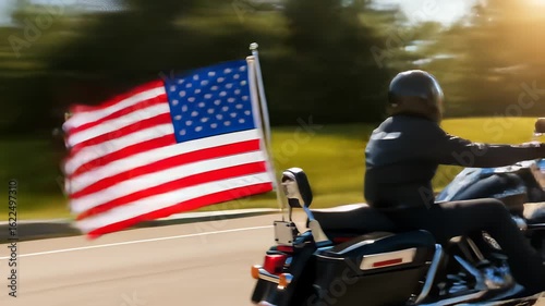 Patriotic Ride: American Flag Waving on Motorcycle on Open Road