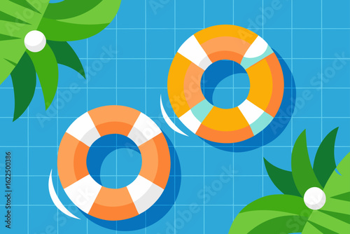 Two colorful life preservers floating in a blue swimming pool with palm leaves