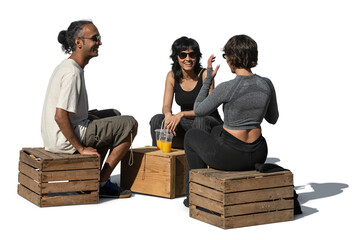 Multinational group of people sitting on wooden boxes in a casual hipster outdoor cafe and talking, isolated on transparent and white background